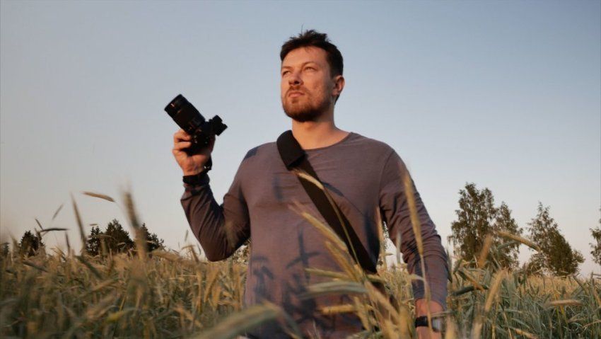 Mitchell Kanashkevich walking through a field
